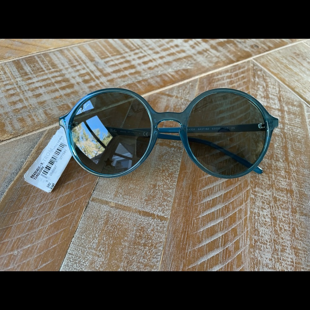 Ray-Ban RB4304 Round Sunglasses in transparent turquoise